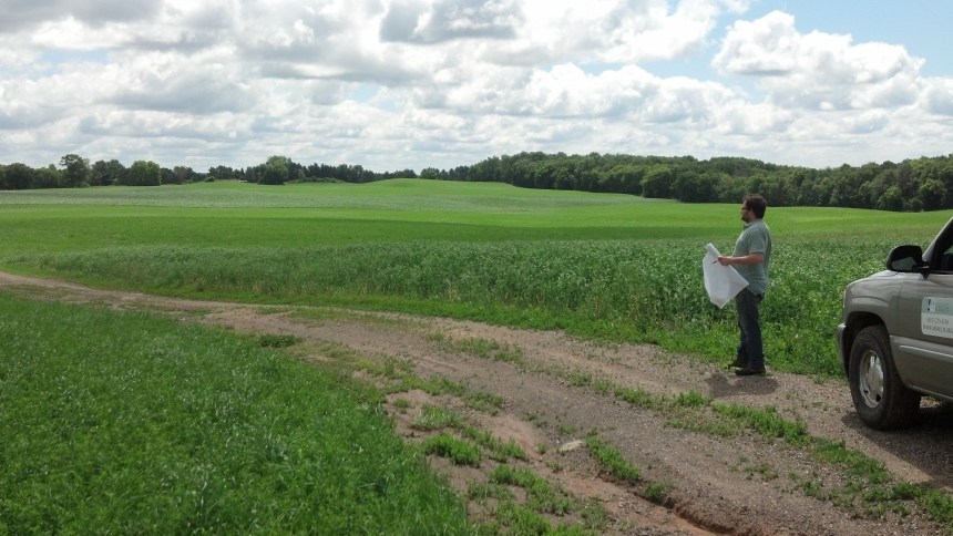 wcd employee andy schilling looks for conservation opportunities on cropland