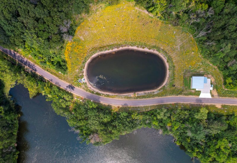 Aerial photo of pond, lake, and trail